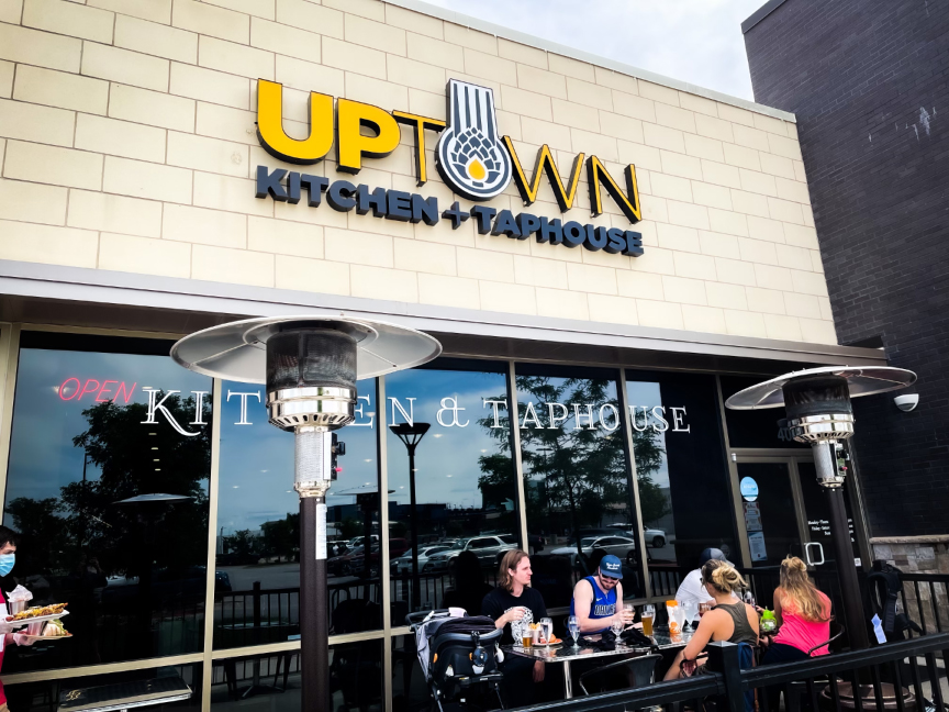 Uptown Kitchen + Taphouse logo